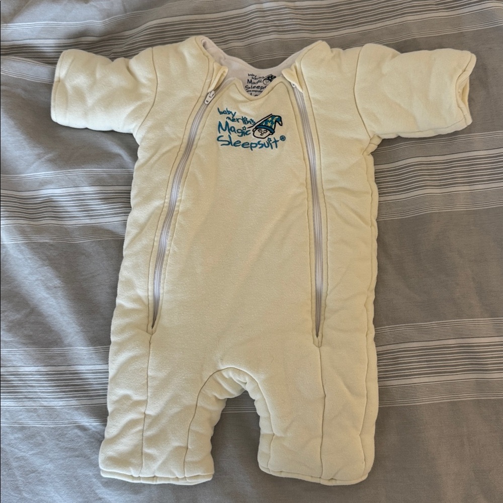 Baby Merlin's Magic Sleepsuit - Soft Cream